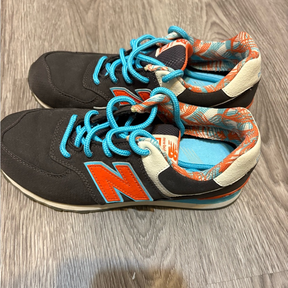 New Balance Kids' Black and Blue Sneakers with Orange Accents